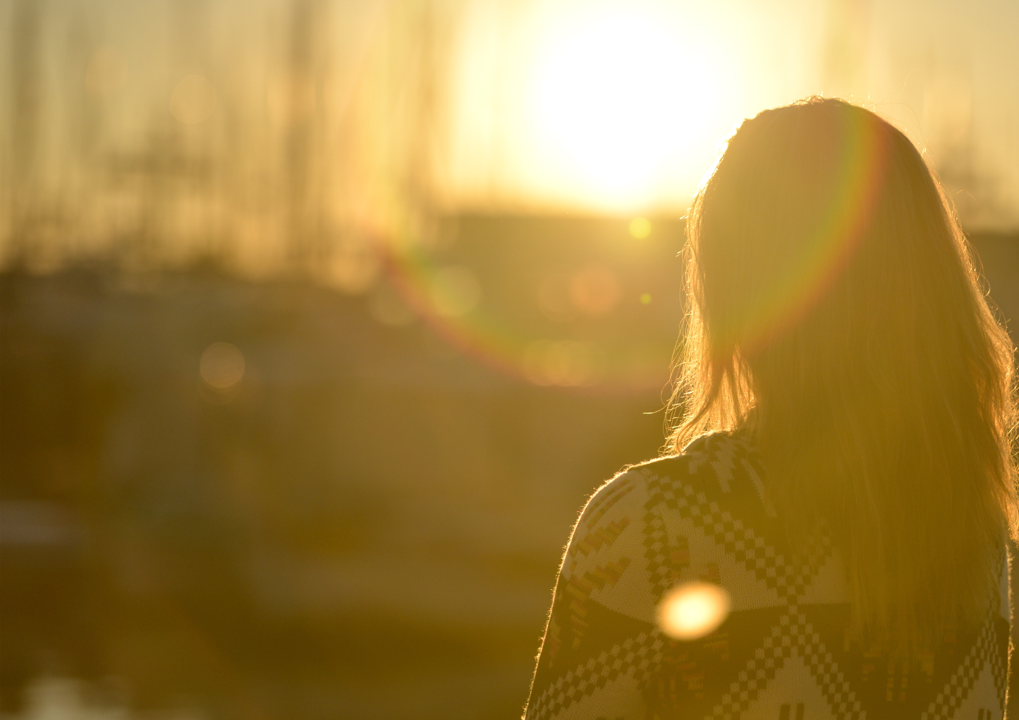 Frau mit Sonne